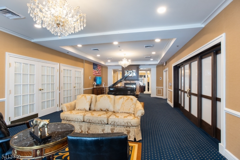 41 Springfield Avenue Summit, NJ 07901 - Photo 7 of 19 a living room with furniture and a fireplace