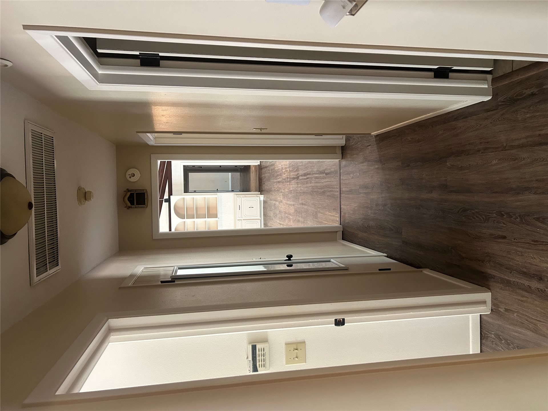2913 Springdale Lane Duncan, OK 73533 - Photo 13 of 32 Wood-finish flooring throughout, recessed built-in shelving, and white interior doors