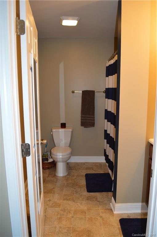 3822 Jenkins Road Blacksburg, SC 29702 - Photo 14 of 23 a bathroom with a toilet and a shower