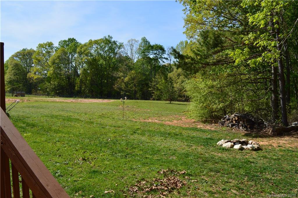 3822 Jenkins Road Blacksburg, SC 29702 - Photo 22 of 23 a view of a field with a tree