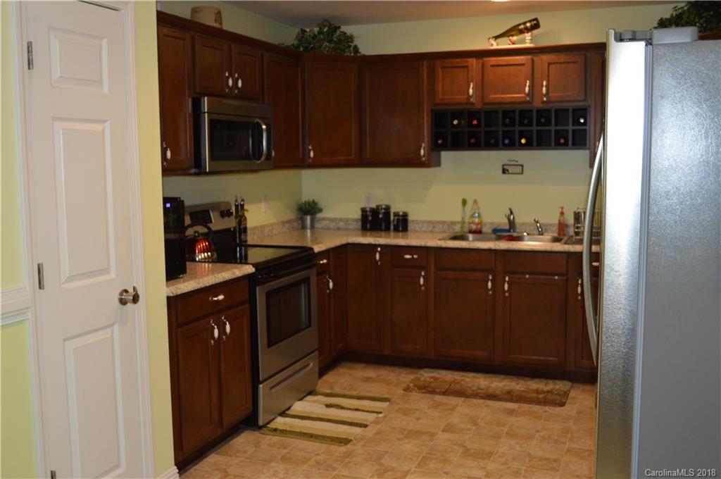 3822 Jenkins Road Blacksburg, SC 29702 - Photo 8 of 23 a kitchen with a sink and cabinets