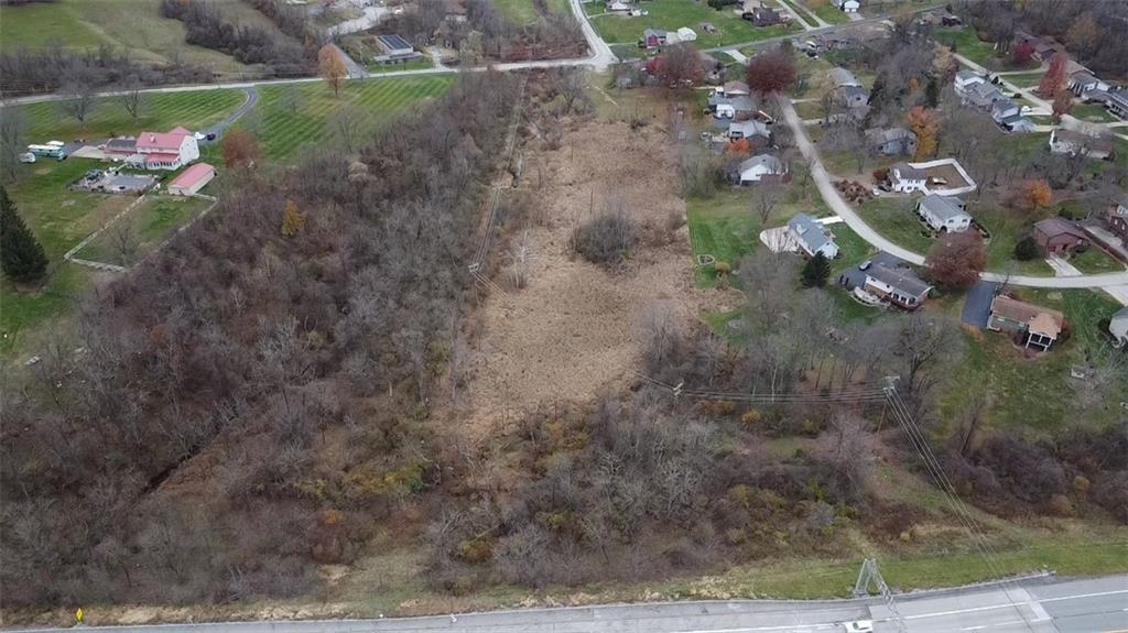 295 Walnut Hill Road Uniontown, PA 15401 - Photo 8 of 11 a backyard of a house with lots of green space