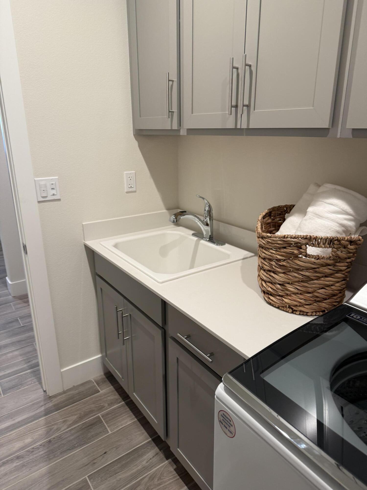 39912 Felicita Parkway Palm Desert, CA 92211 - Photo 16 of 32 a kitchen with a sink and cabinets