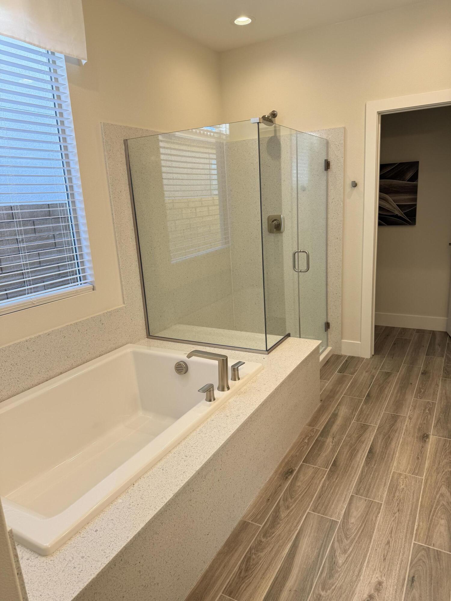 39912 Felicita Parkway Palm Desert, CA 92211 - Photo 19 of 32 a bathroom with a bathtub and a shower