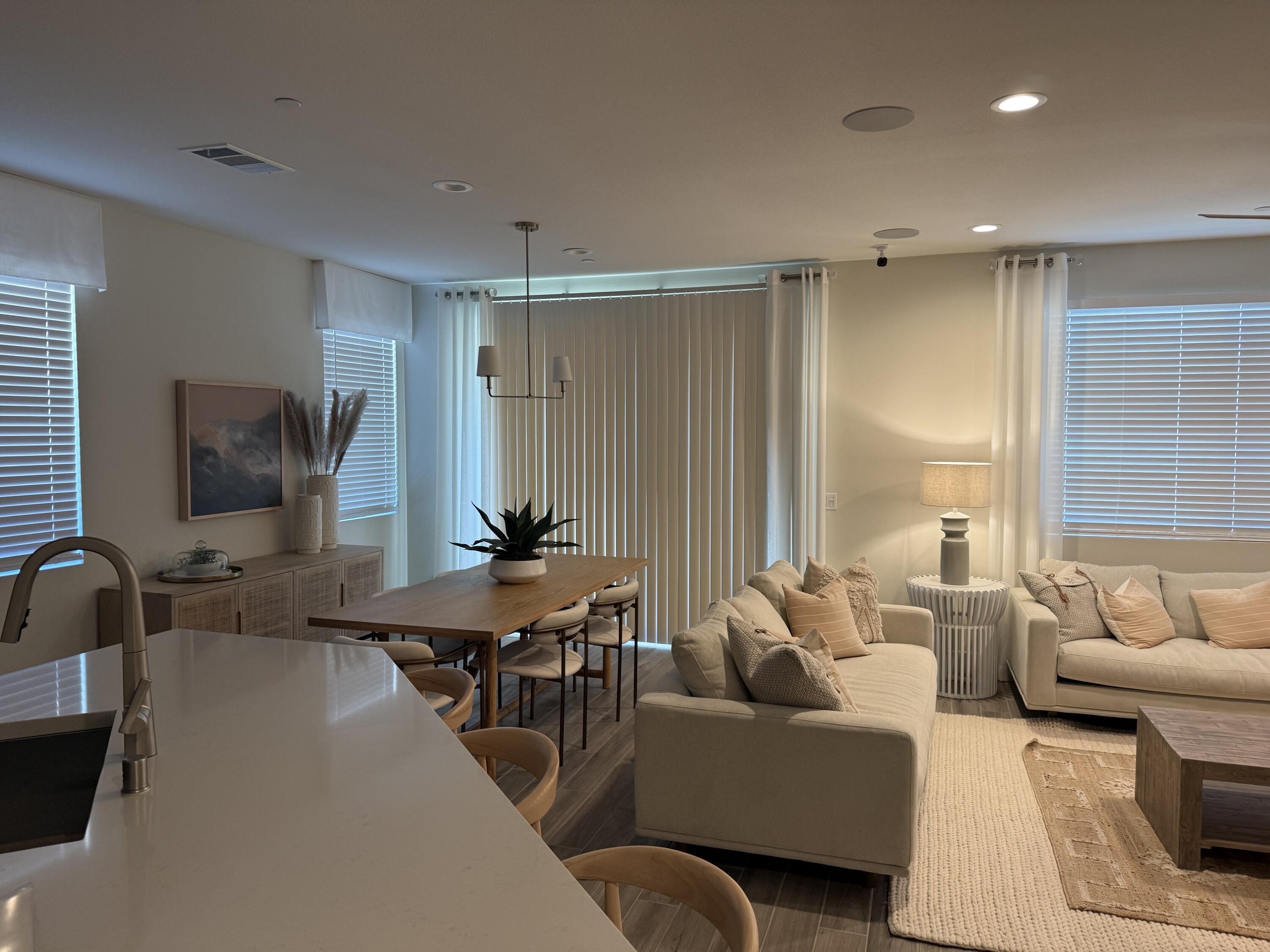 39912 Felicita Parkway Palm Desert, CA 92211 - Photo 7 of 32 a living room with furniture and a flat screen tv
