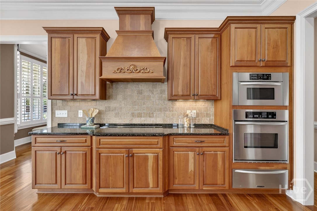 197 Cubbedge Drive Rincon, GA 31326 - Photo 8 of 43 Gorgeous custom cabinetry with cooktop and separate oven