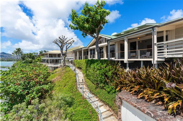 a spacious bathroom with a bathtub sink and mirror