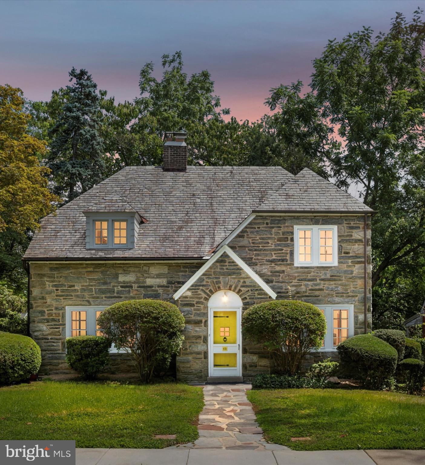 63 South Hillcrest Road Springfield, PA 19064 - Photo 2 of 32 a front view of a house with a yard