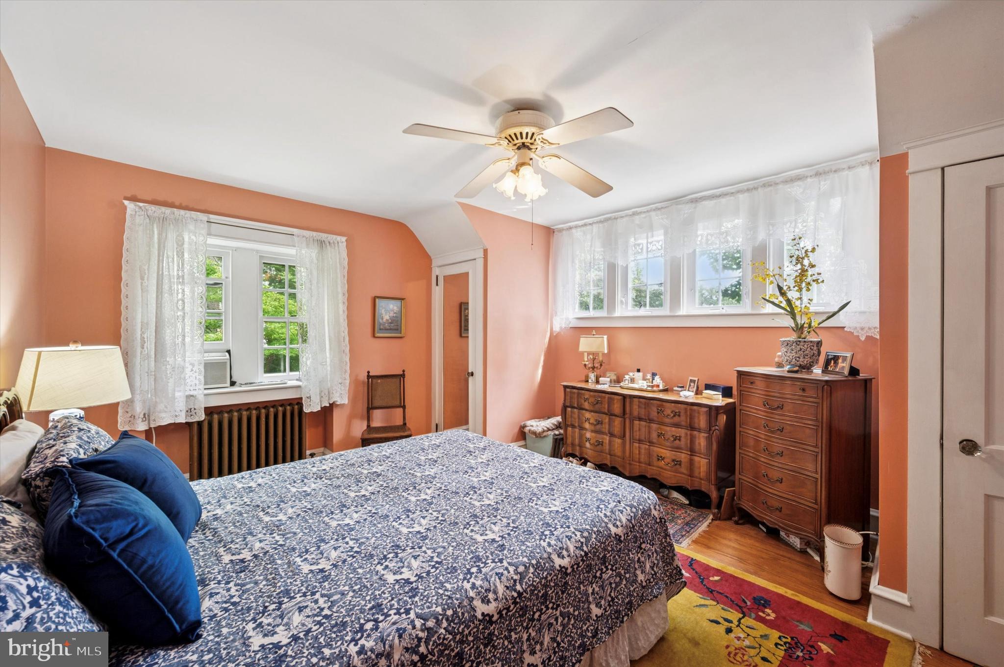 63 South Hillcrest Road Springfield, PA 19064 - Photo 23 of 32 a bedroom with a bed and a chandelier