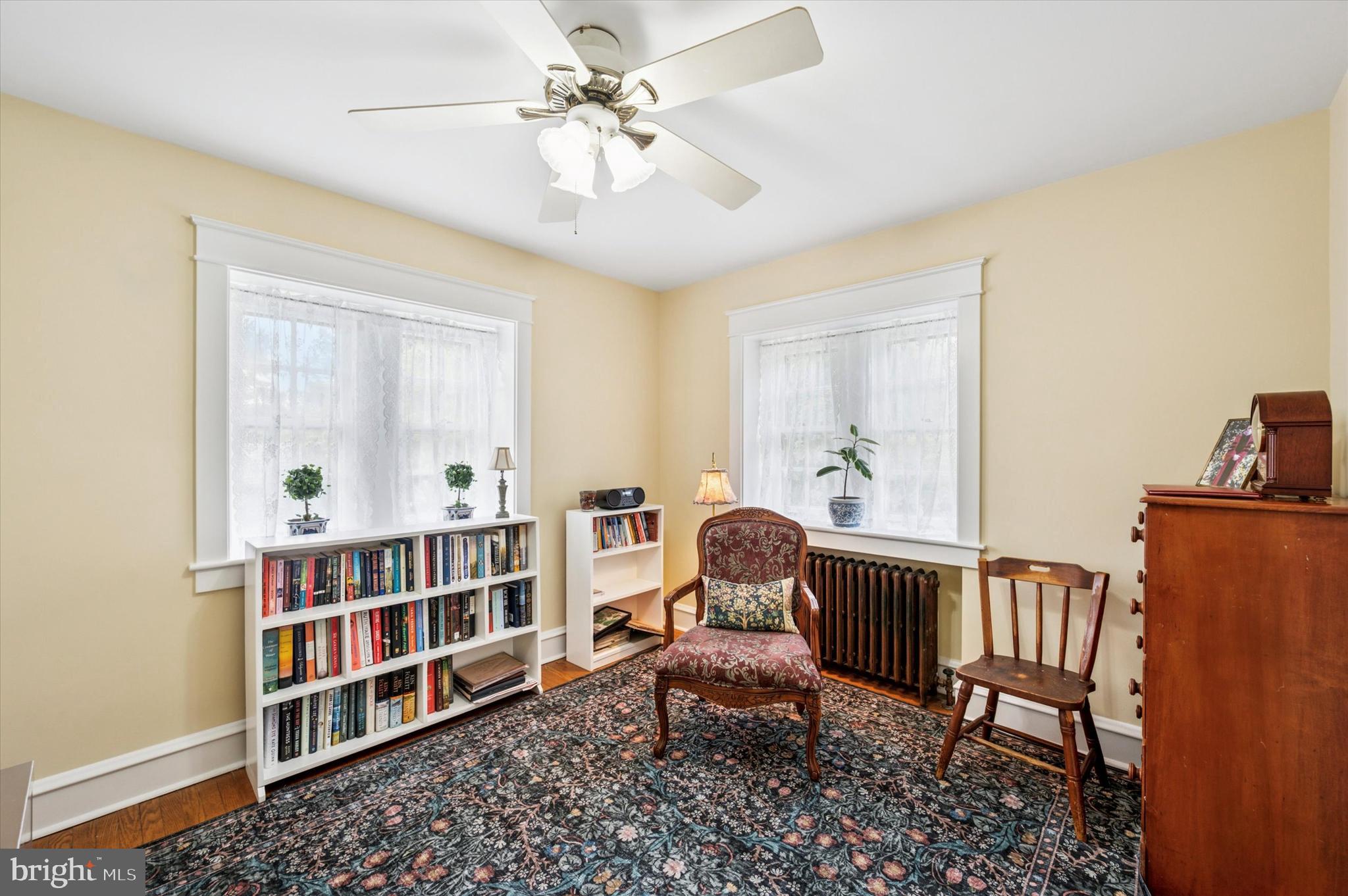 63 South Hillcrest Road Springfield, PA 19064 - Photo 25 of 32 a living room with furniture and a book shelf