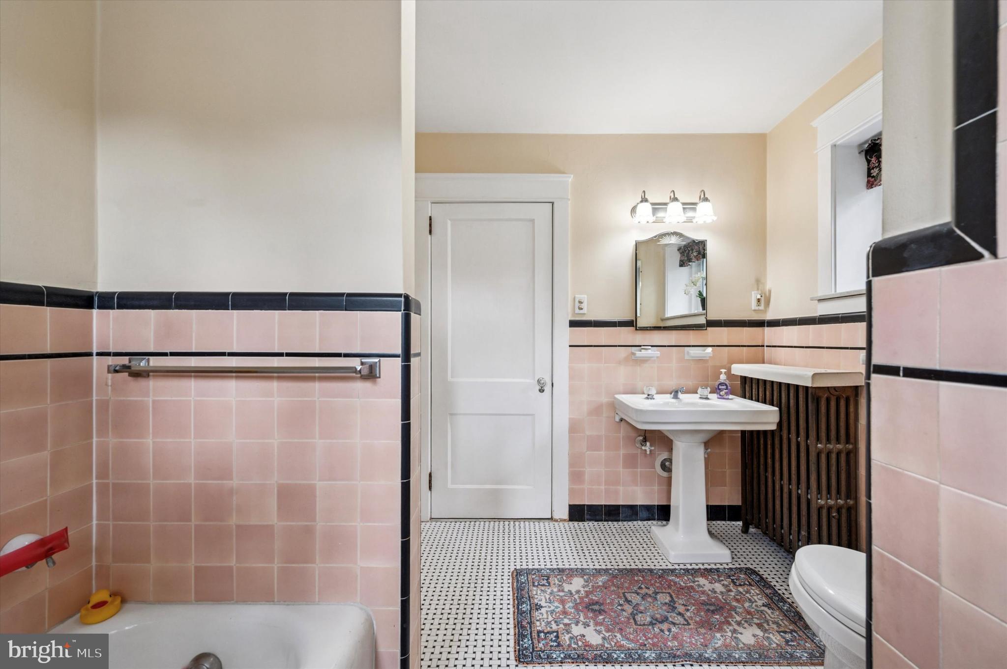 63 South Hillcrest Road Springfield, PA 19064 - Photo 27 of 32 a bathroom with a sink a mirror and a shower