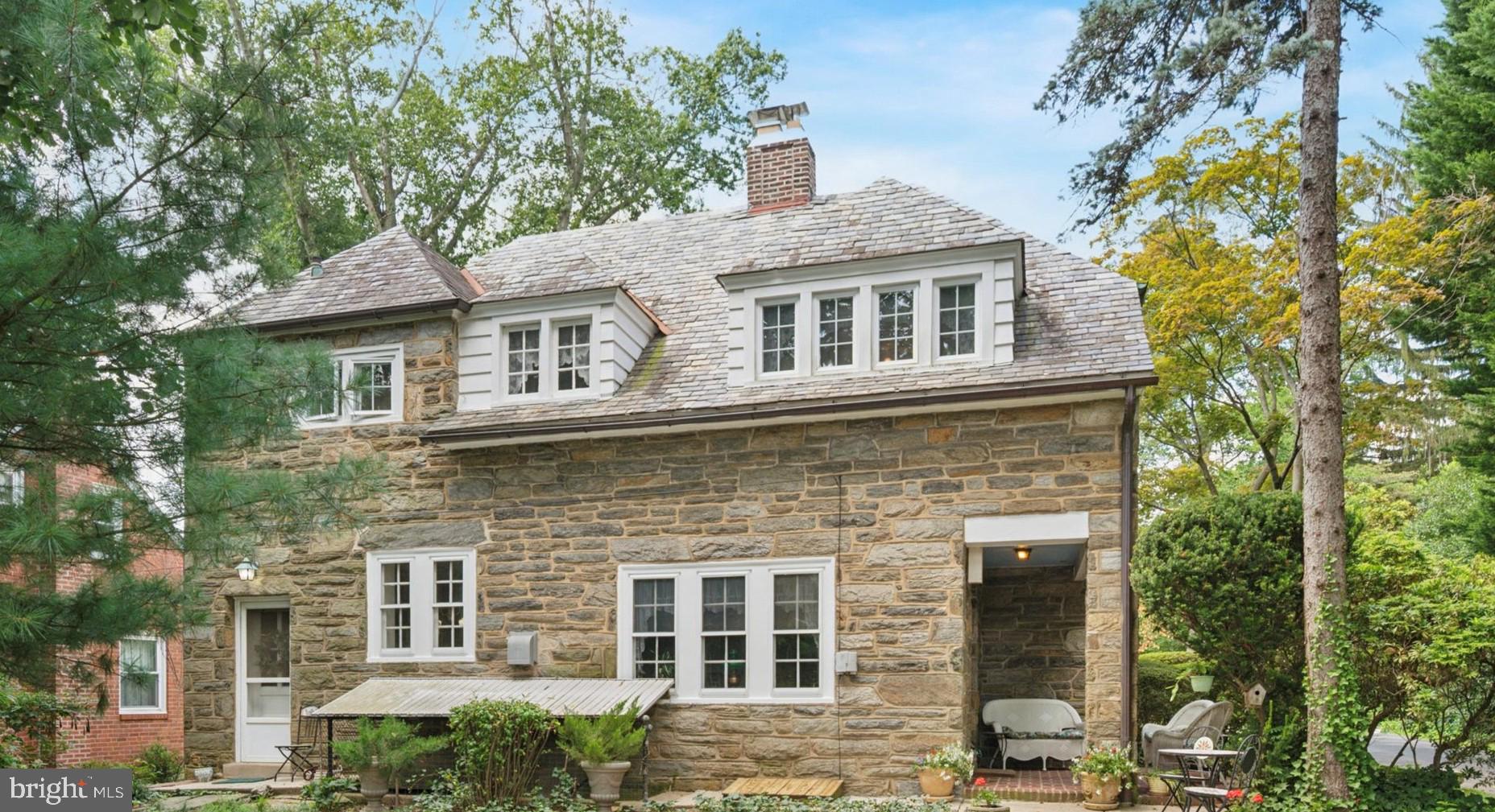 63 South Hillcrest Road Springfield, PA 19064 - Photo 32 of 32 front view of a house with a yard