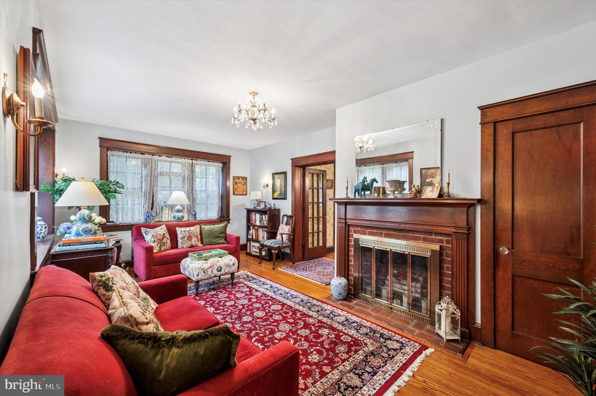 63 South Hillcrest Road Springfield, PA 19064 - Photo 6 of 32 a living room with furniture and a fireplace