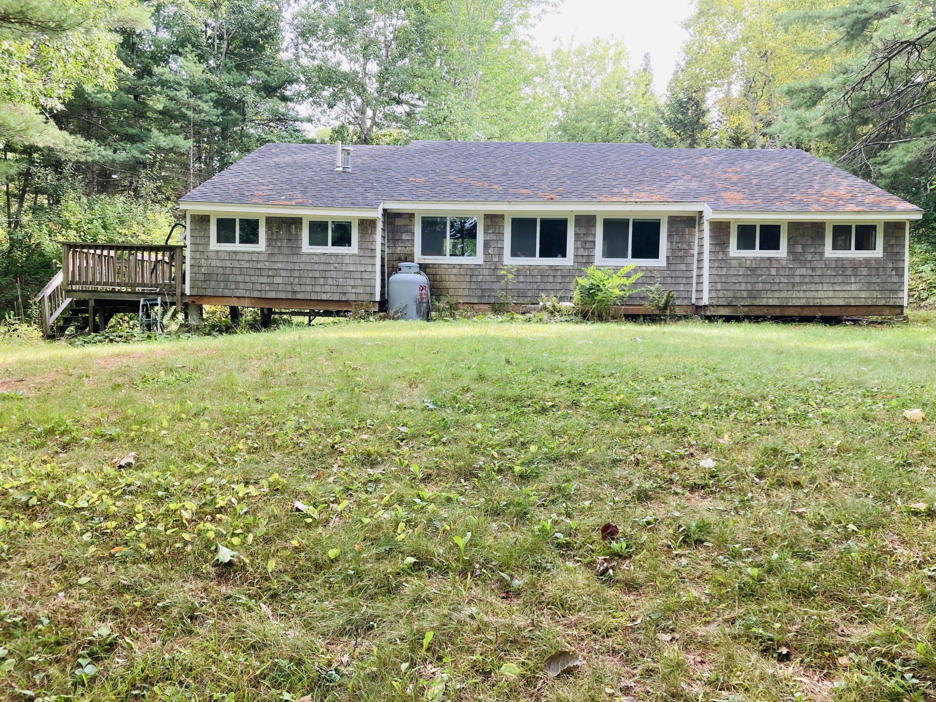 23 South Bay Road Franklin, ME 04634 - Photo 22 of 22 Waterside of house w/deck off kitchen.