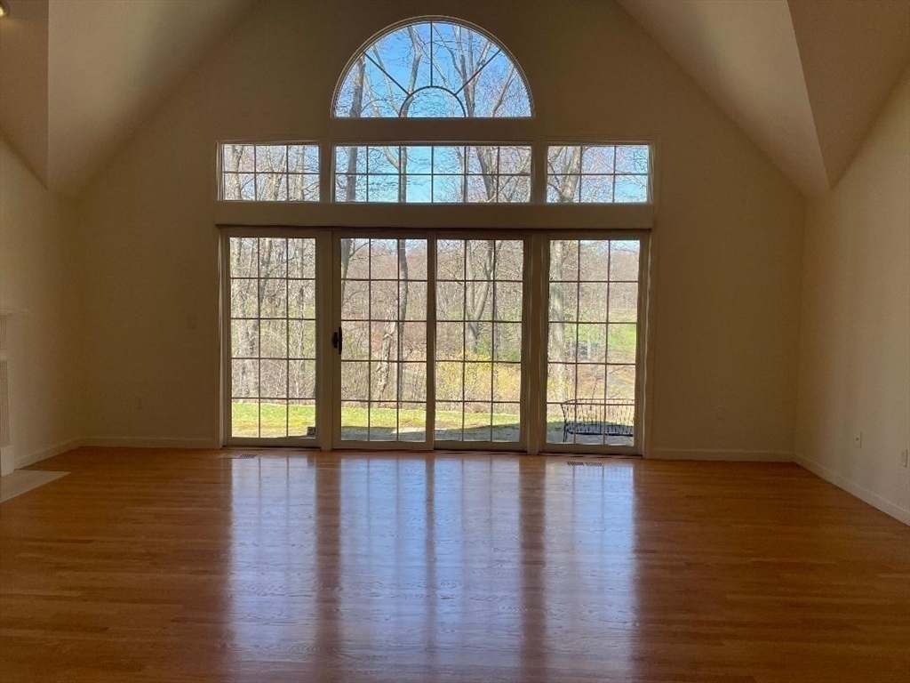 2 Windpath East, Unit 2 West Springfield, MA 01089 - Photo 11 of 41 a view of an empty room with wooden floor and a window