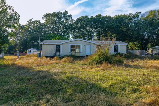 a house view with a garden space