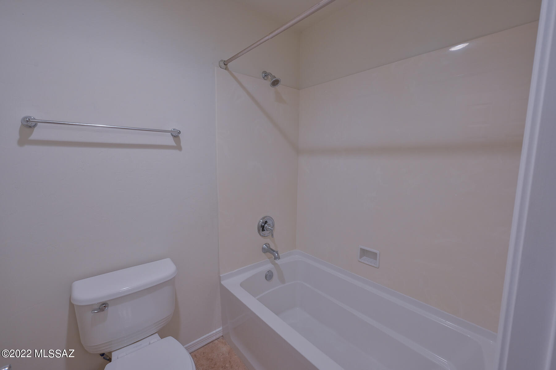 10804 East Salsabila Road Tucson, AZ 85747 - Photo 34 of 50 a bathroom with a toilet and a bathtub