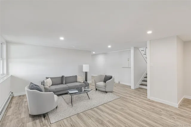 a view of bathroom with a washer and dryer