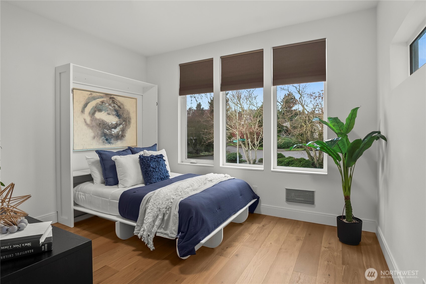 4758 Green Lake Way North Seattle, WA 98103 - Photo 12 of 26 a bedroom with a large bed and a window
