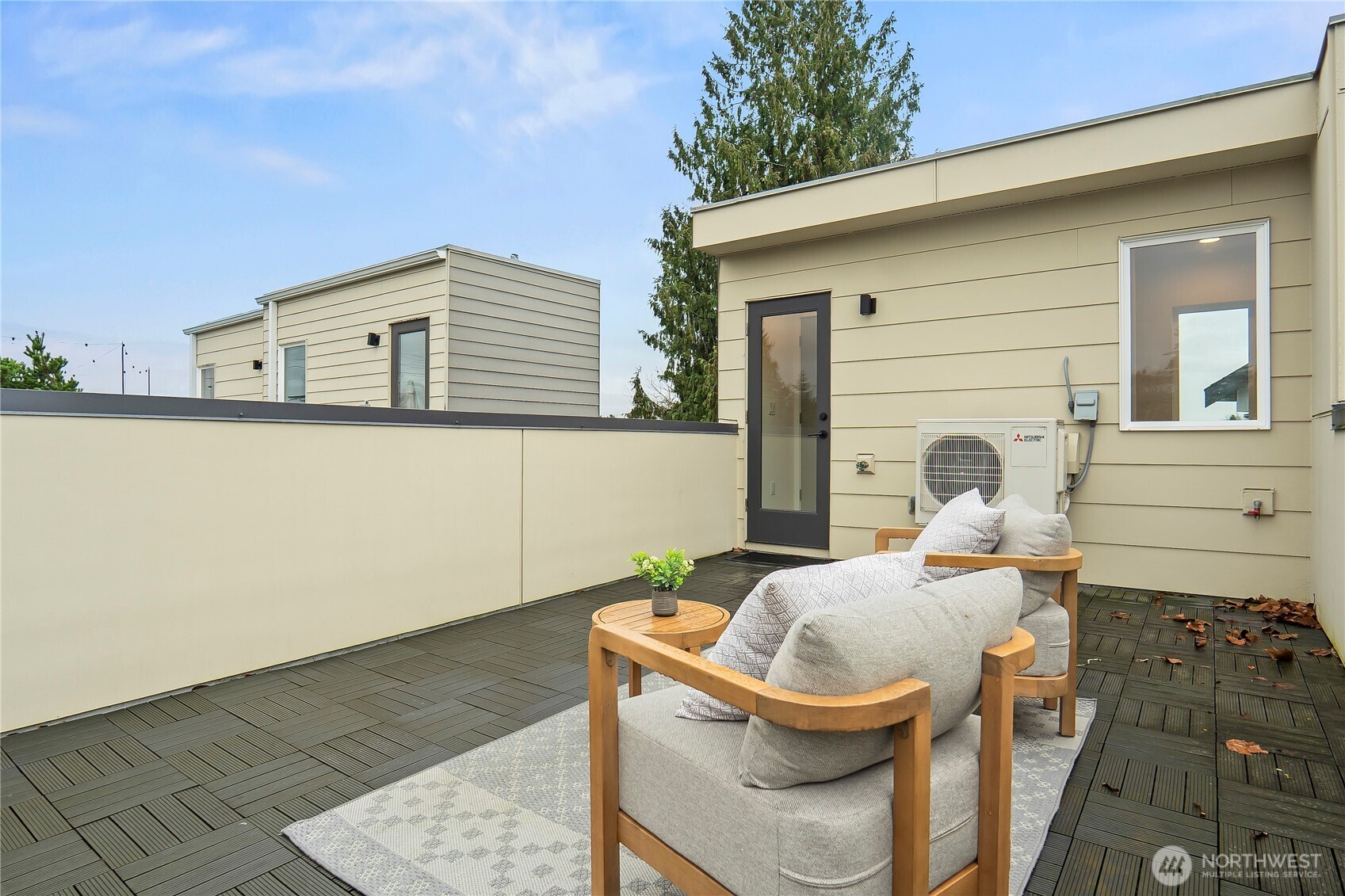 4758 Green Lake Way North Seattle, WA 98103 - Photo 22 of 26 a backyard of a house with table and chairs