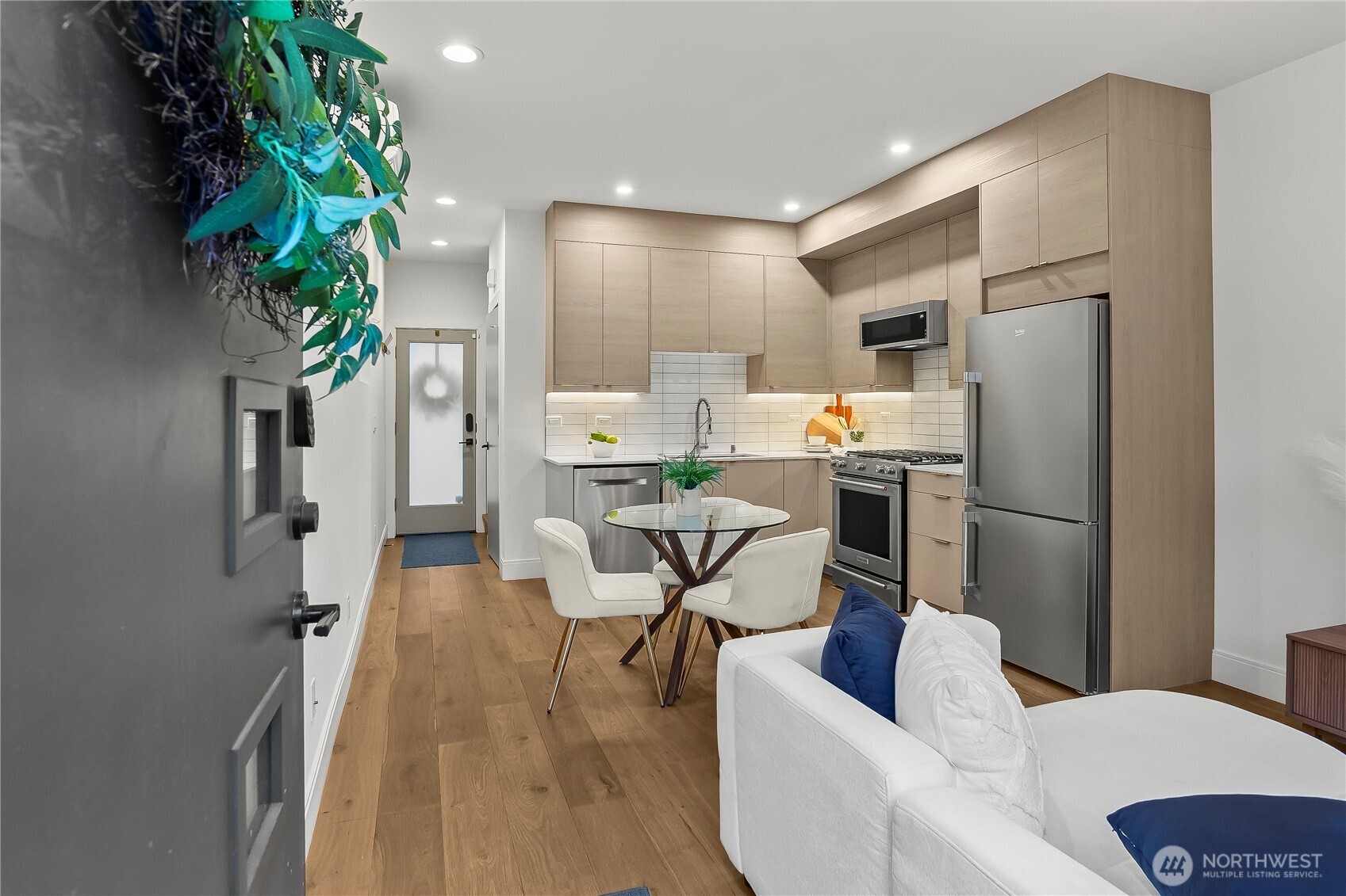 4758 Green Lake Way North Seattle, WA 98103 - Photo 4 of 26 a living room with furniture and a potted plant