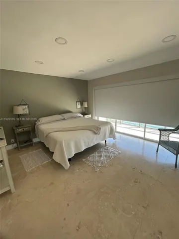 a view of an empty room with cabinet