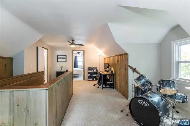 a view of a livingroom with furniture and storage