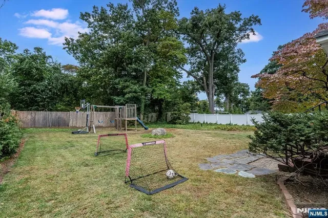 a view of a backyard with slide