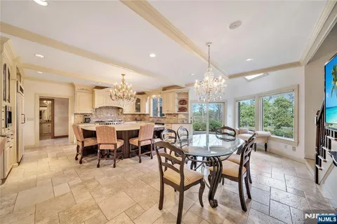 a view of a dining room with furniture window and outside view