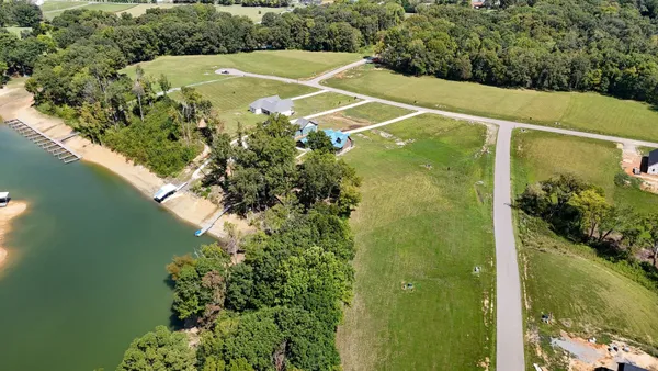 a view of a swimming pool and lake view