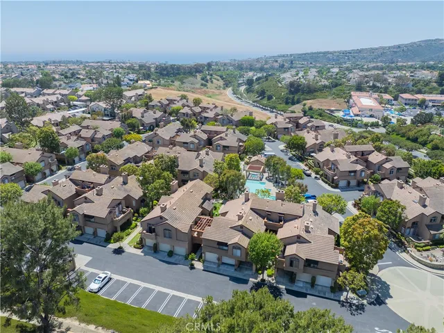 an aerial view of a city with lots of residential buildings