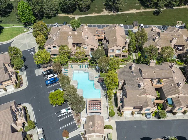 an aerial view of a house with a garden