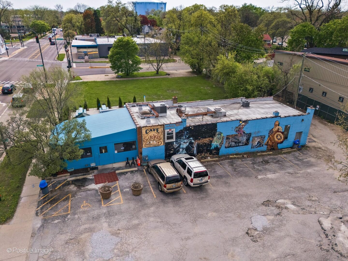 an aerial view of a house with outdoor space