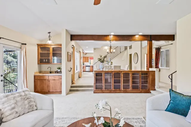 a living room with furniture and a window