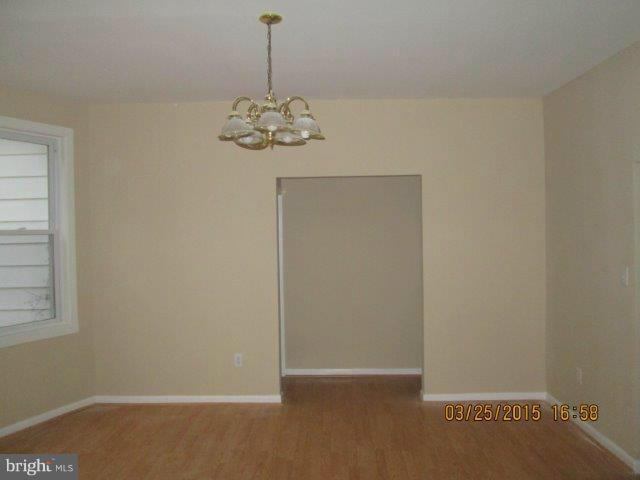 5414 Tramore Road Baltimore, MD 21214 - Photo 6 of 24 a view of a chandelier in a room