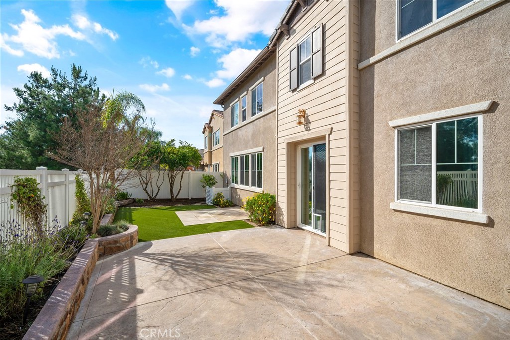28817 Edenton Way Temecula, CA 92591 - Photo 47 of 56 a view of a house with a yard and pathway