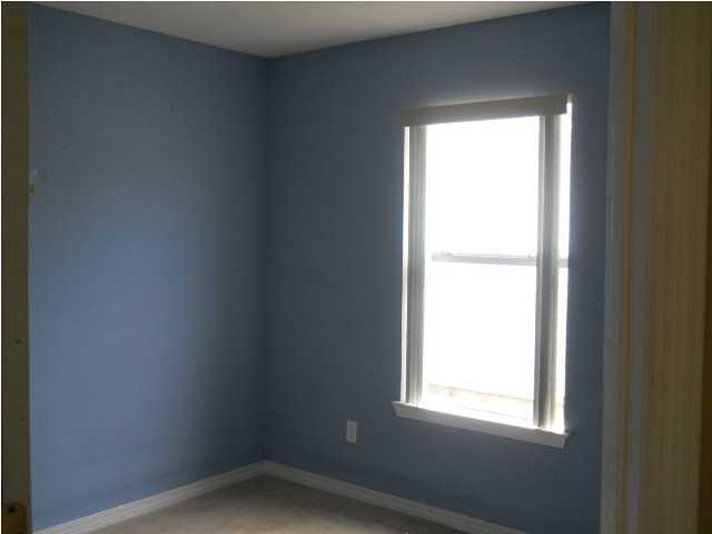 7676 Chablis Circle Navarre, FL 32566 - Photo 7 of 10 a small space with a window