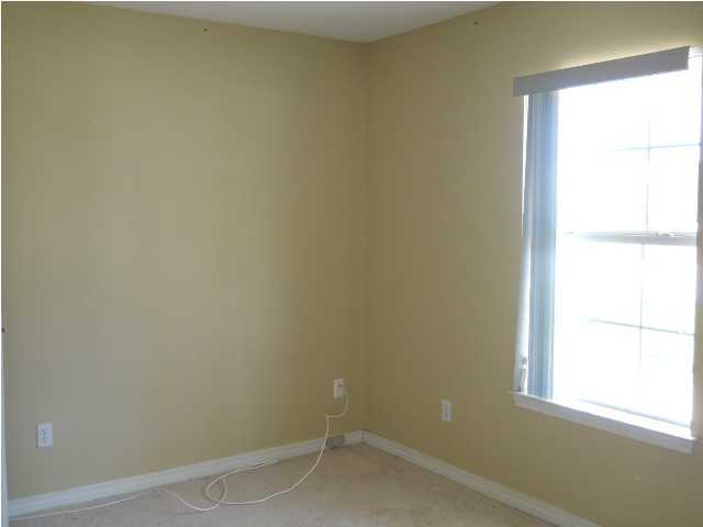 7676 Chablis Circle Navarre, FL 32566 - Photo 8 of 10 a small space with a window