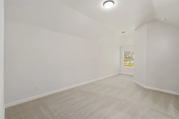 a bathroom with a bathtub and a toilet