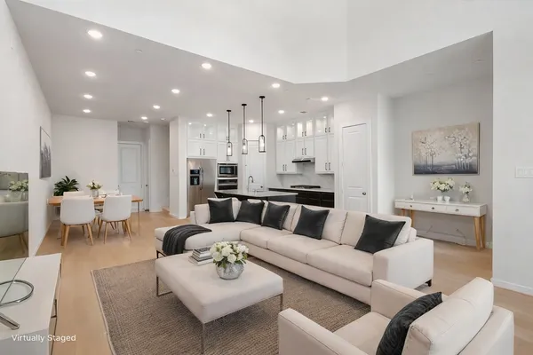 a view of a house with a yard and garage