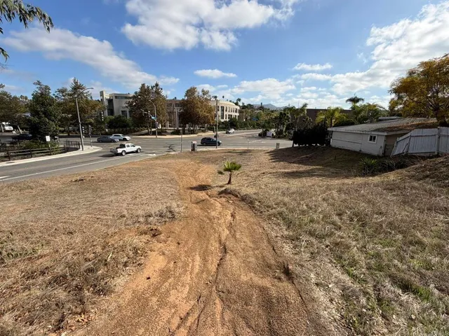 a view of a street with houses