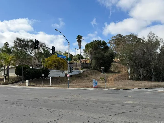 a view of a playground with basketball court