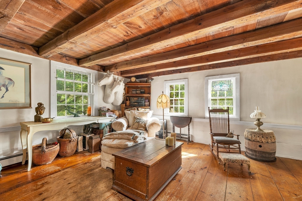 8 Ferry Road Salisbury, MA 01952 - Photo 14 of 42 a living room with furniture large window and wooden floor