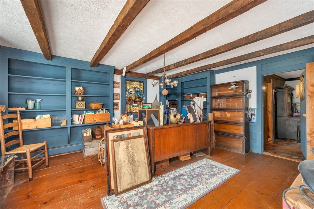 8 Ferry Road Salisbury, MA 01952 - Photo 15 of 42 a living room filled with furniture and a table