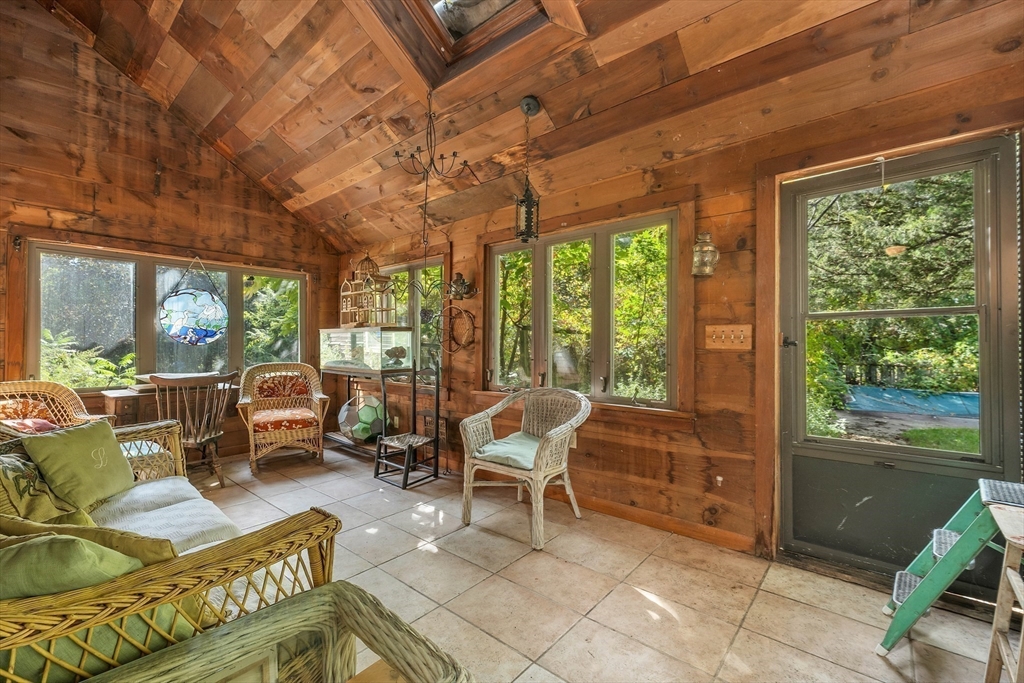 8 Ferry Road Salisbury, MA 01952 - Photo 20 of 42 a living room with furniture and a large window