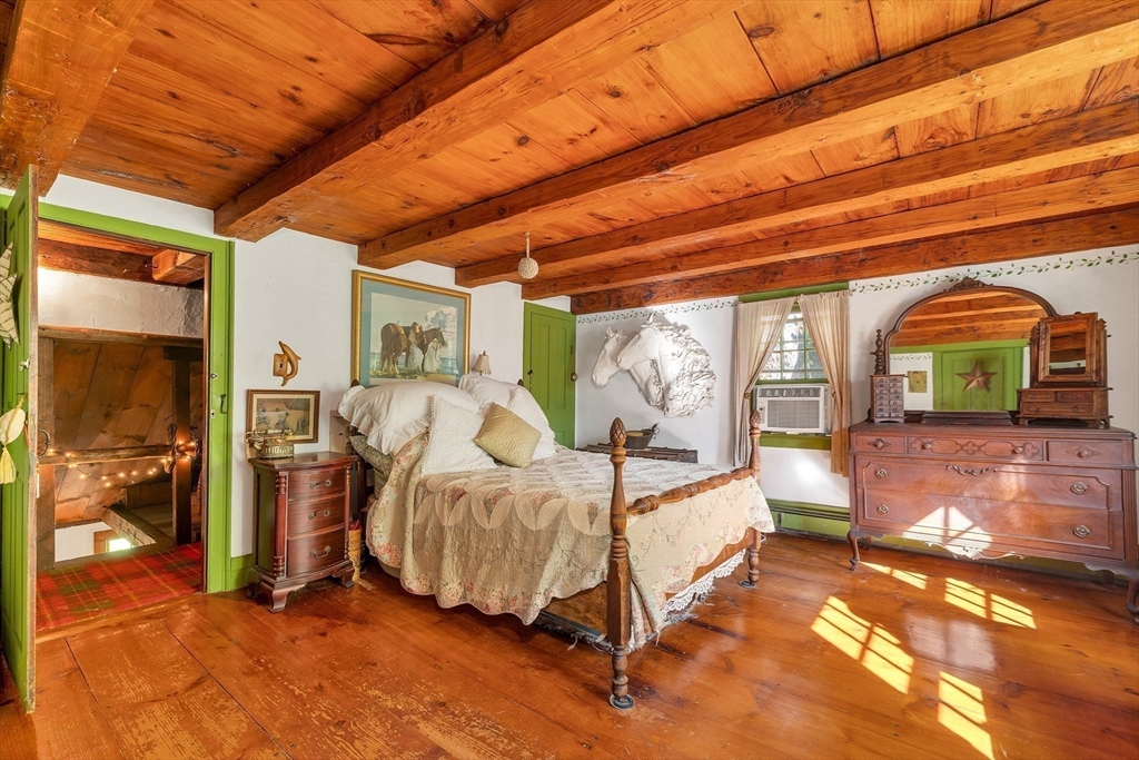 8 Ferry Road Salisbury, MA 01952 - Photo 26 of 42 a bedroom with bed and balcony