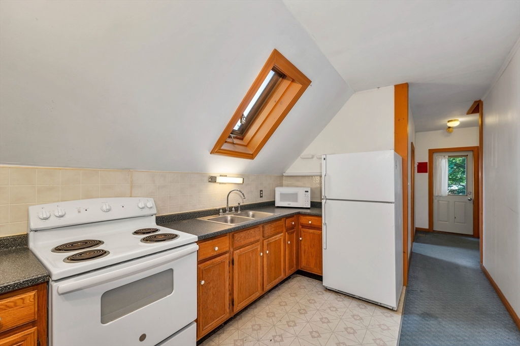 8 Ferry Road Salisbury, MA 01952 - Photo 36 of 42 a view of kitchen and washer and dryer