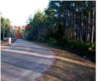 Lot 52 Mallet Bayou Road Freeport, FL 32439 - Photo 3 of 4 a view of backyard with green space
