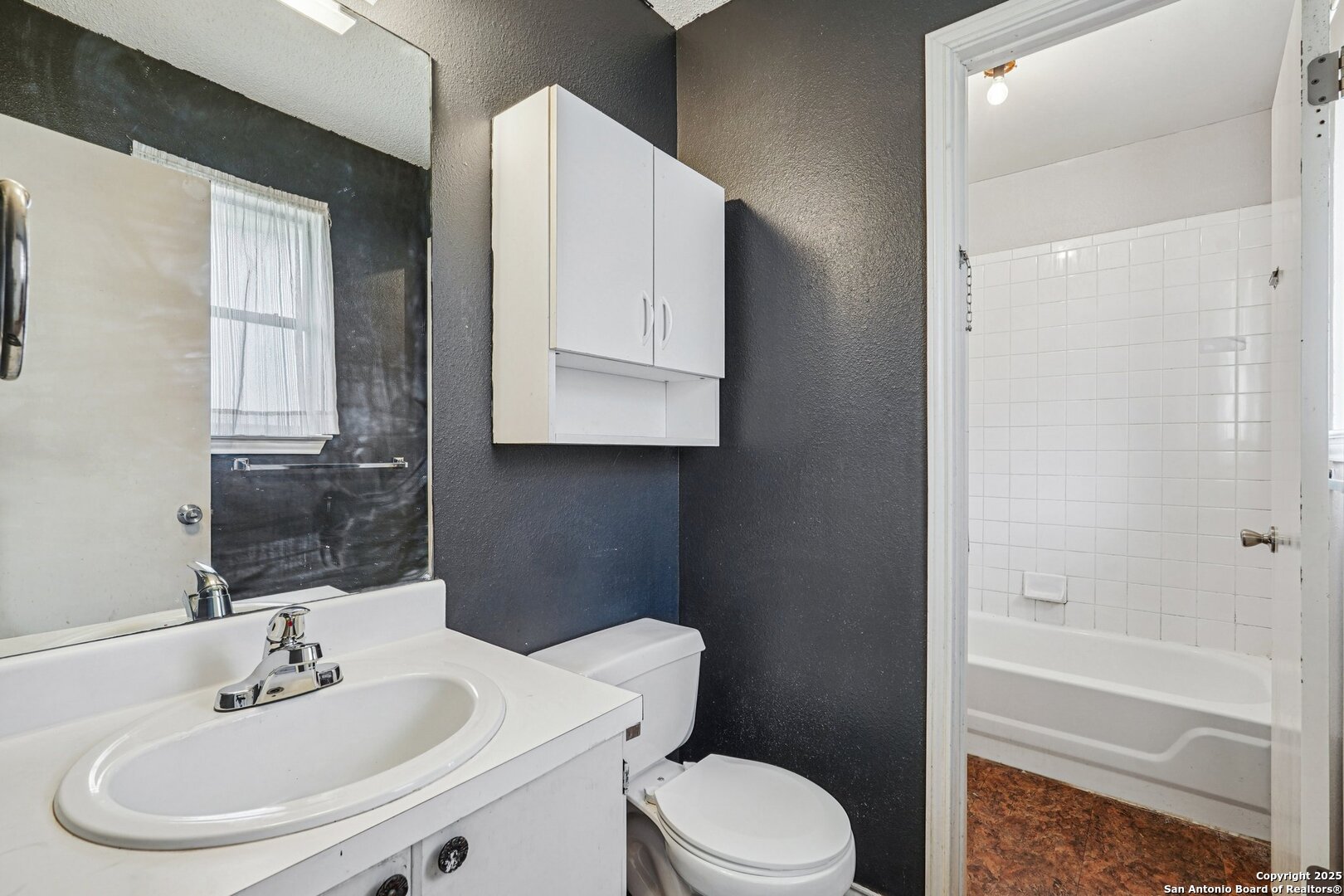 1601 Newton Street Kerrville, TX 78028 - Photo 14 of 23 a bathroom with a sink toilet and shower