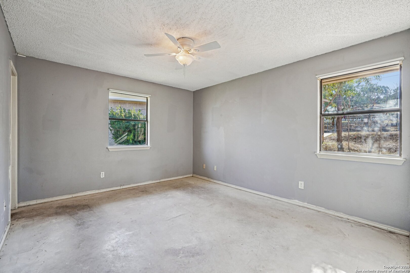 1601 Newton Street Kerrville, TX 78028 - Photo 15 of 23 a view of an empty room with a window